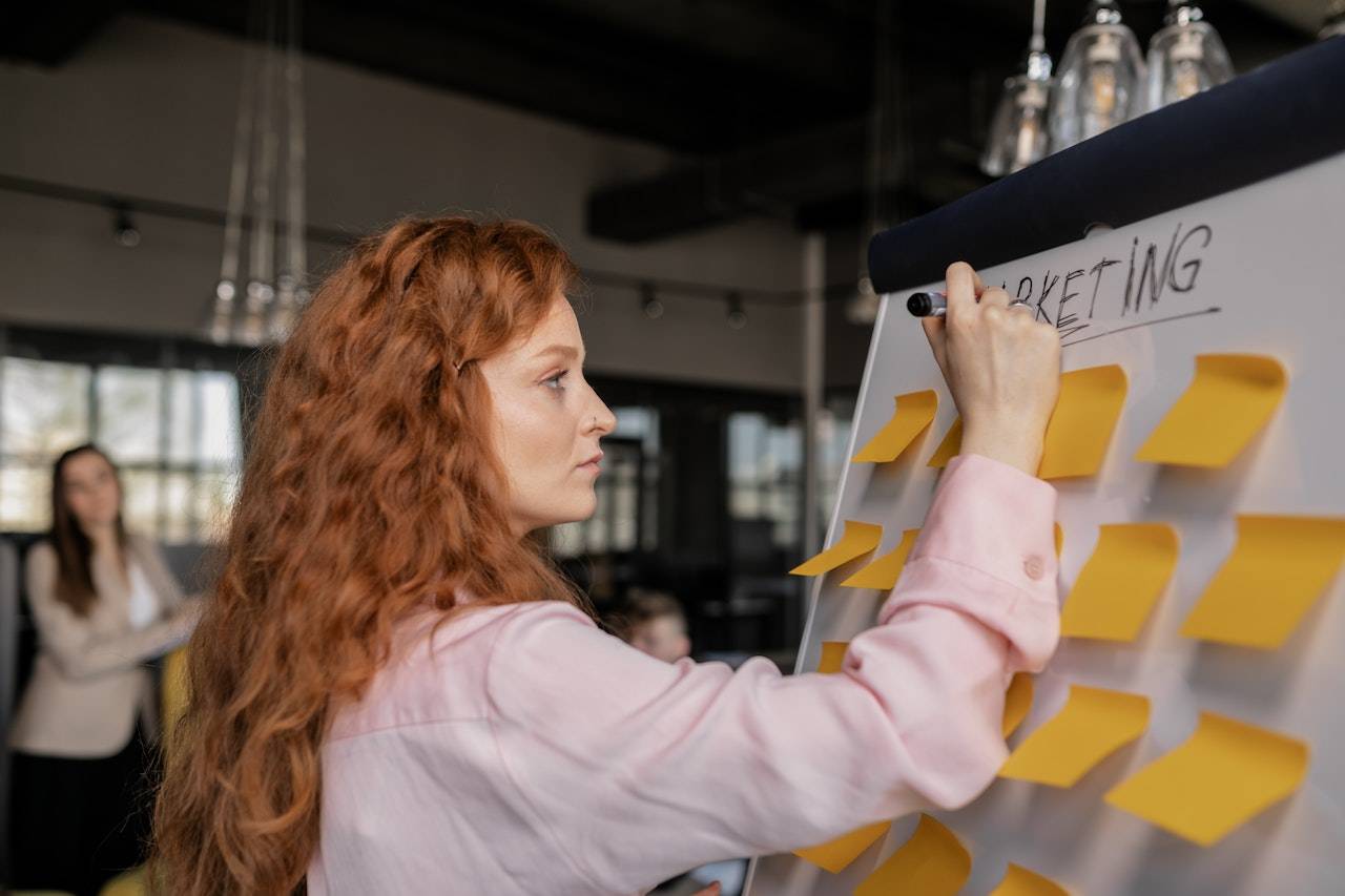 female employee works on marketing plan